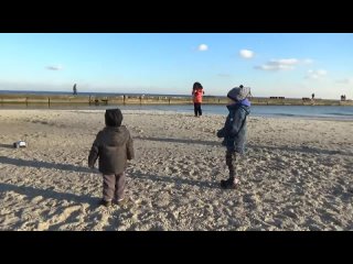 max plays with a machine at sea